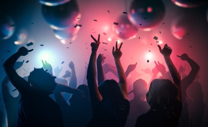 YoungThe Latest Club Etiquette Tips That You Should Use on Your Night Out happy people are dancing in club. Nightlife and disco concept. The Latest Club Etiquette Tips